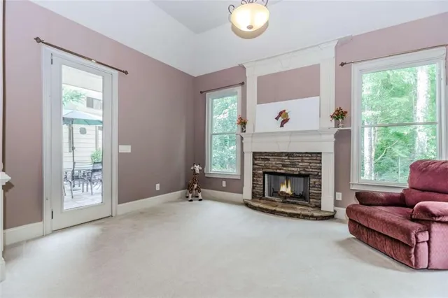 a bathroom with a toilet a sink and a mirror
