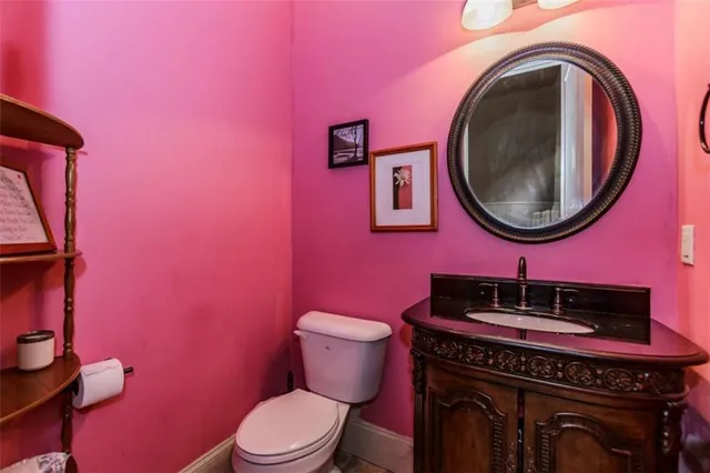 a view of a house with pool lawn chairs and a yard