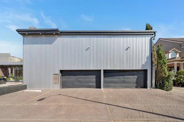 a front view of a house with a garage