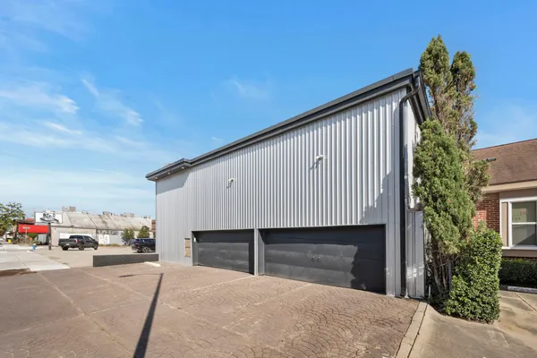 a view of car parked in front of house
