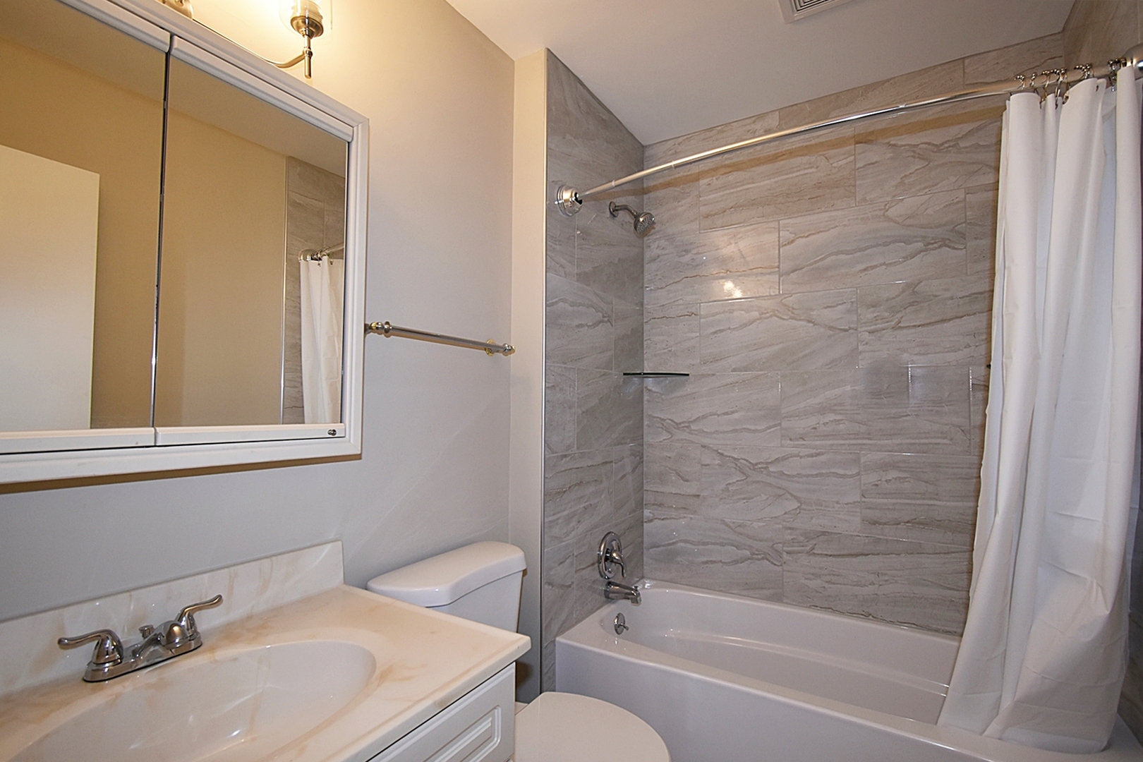 1191 Meadow Lane Elgin, IL 60123 - Photo 18 of 35 a bathroom with a sink toilet and shower