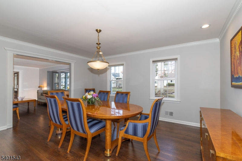 11 Wickham Way Chatham, NJ 07928 - Photo 11 of 47 a view of a dining room with furniture and wooden floor
