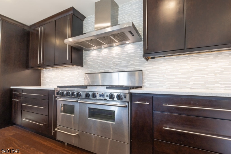 11 Wickham Way Chatham, NJ 07928 - Photo 14 of 47 a stove top oven sitting inside of a kitchen