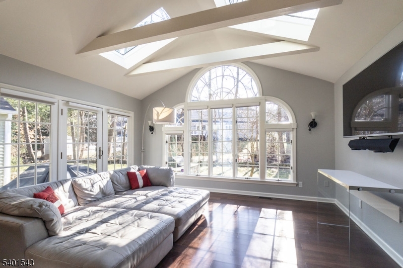 11 Wickham Way Chatham, NJ 07928 - Photo 18 of 47 a bedroom with furniture and a large window