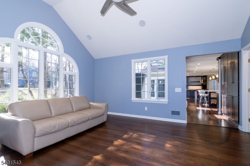11 Wickham Way Chatham, NJ 07928 - Photo 19 of 47 a living room with furniture and a large window
