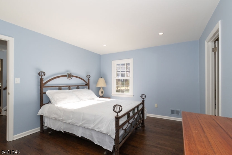 11 Wickham Way Chatham, NJ 07928 - Photo 24 of 47 a bedroom with a bed and window