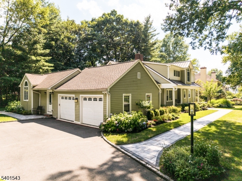 11 Wickham Way Chatham, NJ 07928 - Photo 3 of 47 front view of a house with a yard