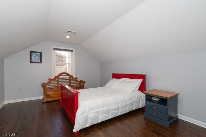 11 Wickham Way Chatham, NJ 07928 - Photo 35 of 47 a bedroom with two beds and wooden floor