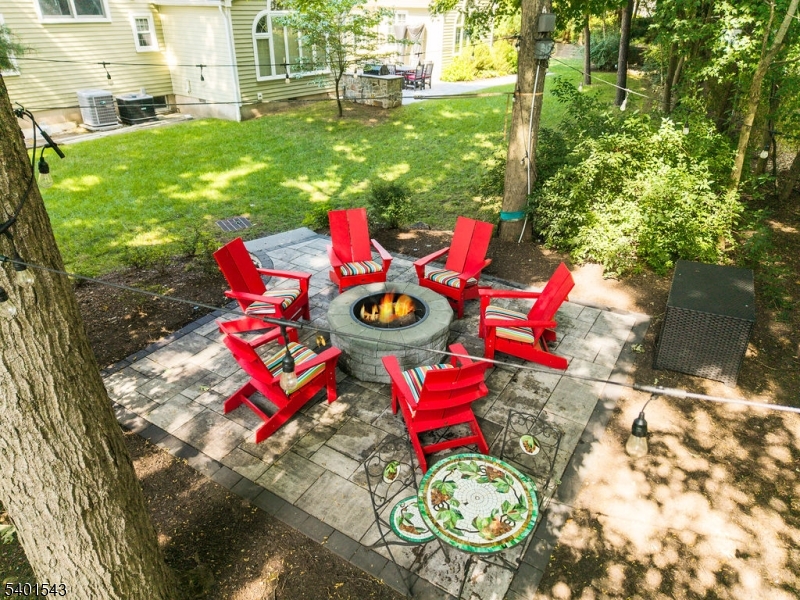 11 Wickham Way Chatham, NJ 07928 - Photo 4 of 47 a view of yard with table and chairs and potted plants