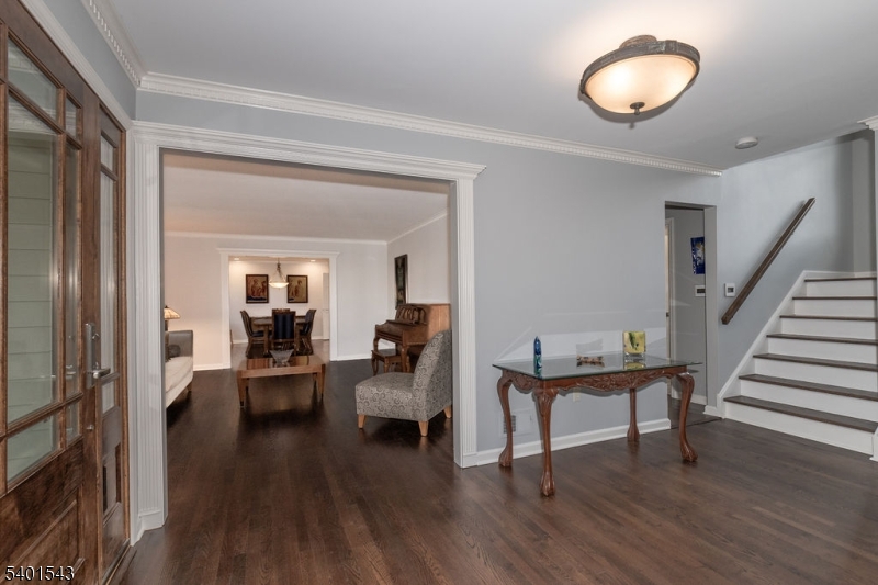 11 Wickham Way Chatham, NJ 07928 - Photo 7 of 47 a view of a livingroom with furniture and hardwood floor