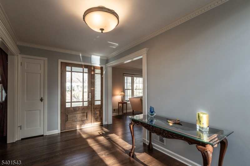 11 Wickham Way Chatham, NJ 07928 - Photo 8 of 47 a view of a room with wooden floor