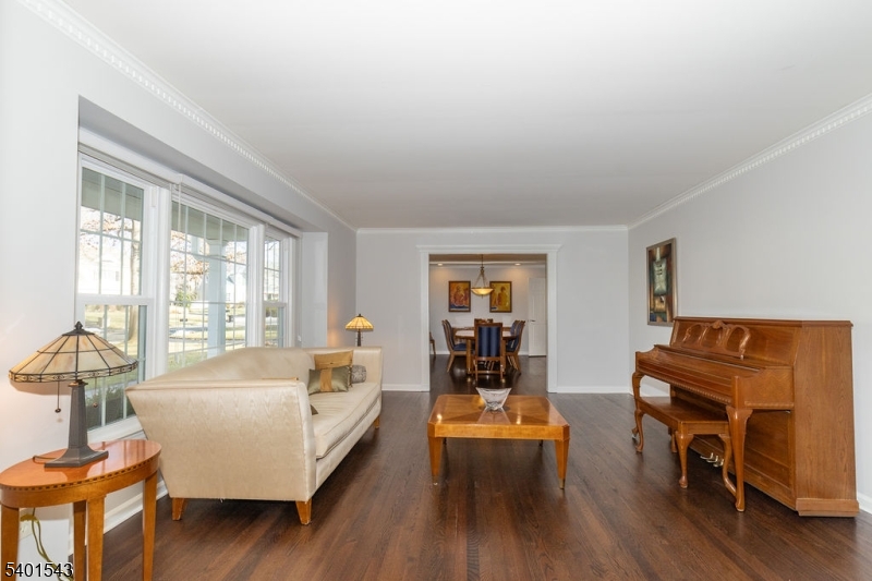 11 Wickham Way Chatham, NJ 07928 - Photo 9 of 47 a living room with furniture and a wooden floor