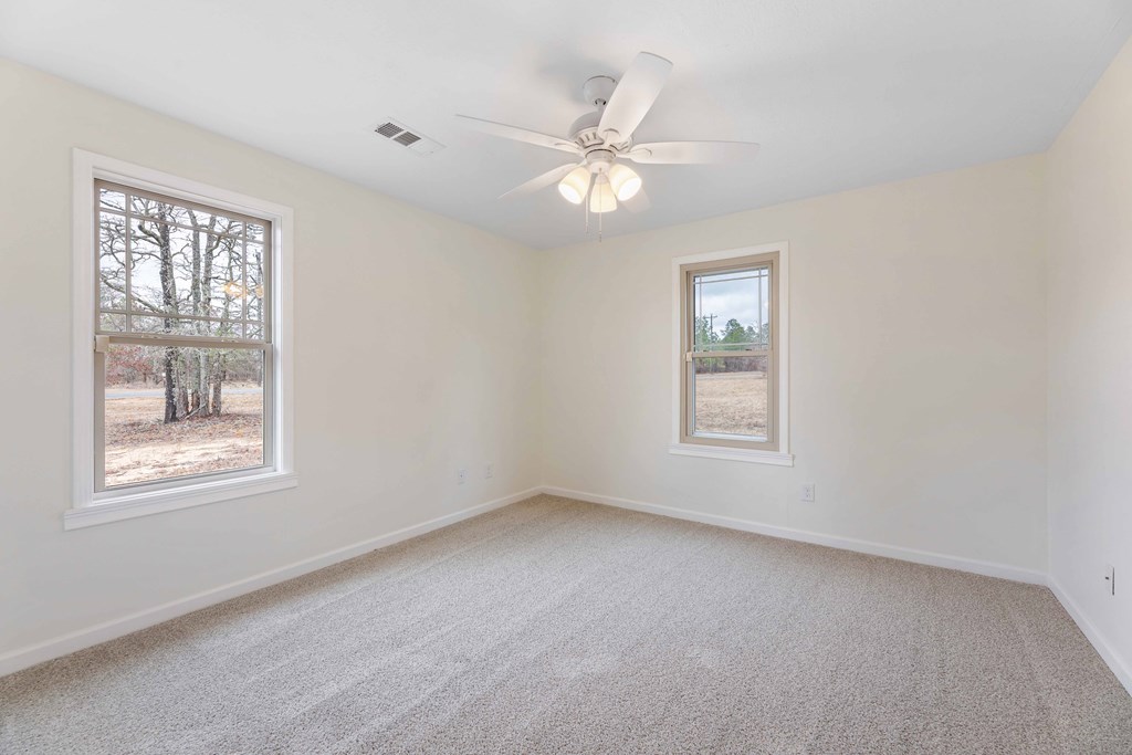 322 Moores Chapel Road Mauk, GA 31058 - Photo 14 of 34 a view of an empty room with a window