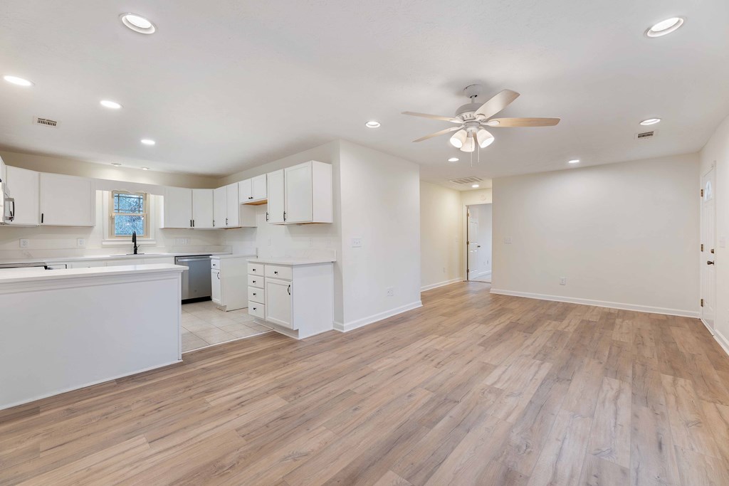 322 Moores Chapel Road Mauk, GA 31058 - Photo 7 of 34 a view of kitchen with wooden floor and window