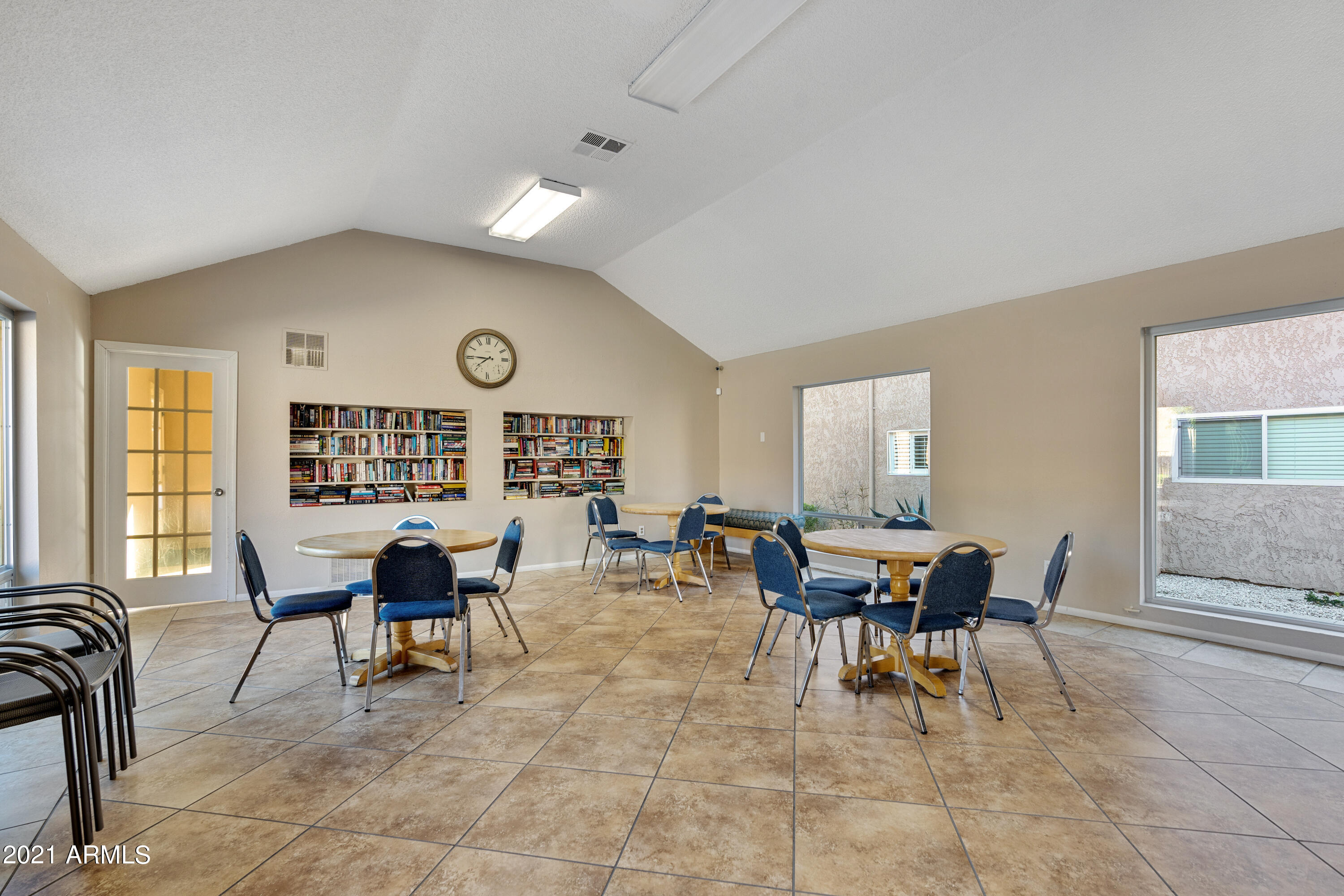 5525 East Thomas Road, Unit Q7 Phoenix, AZ 85018 - Photo 12 of 14 a view of a dining room with furniture