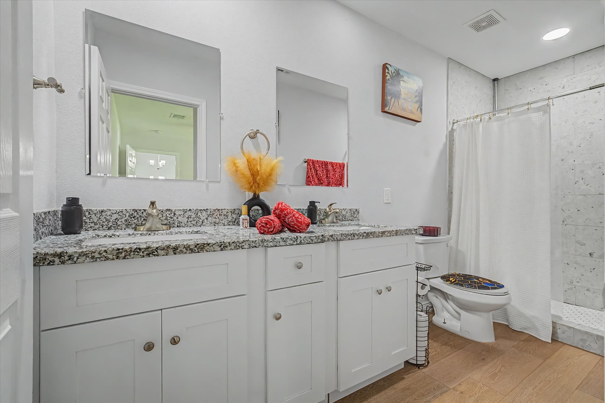6834 New York Street Houston, TX 77021 - Photo 21 of 39 Bright and sophisticated master bathroom complete with contemporary fixtures and an immaculate, inviting atmosphere