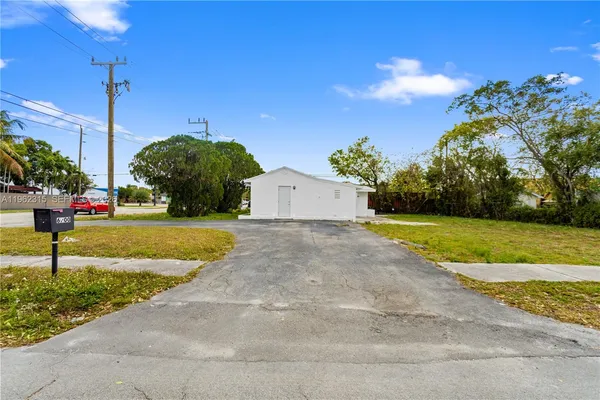 a view of a garden with a yard