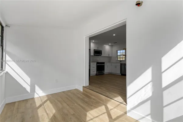 a view of livingroom with kitchen