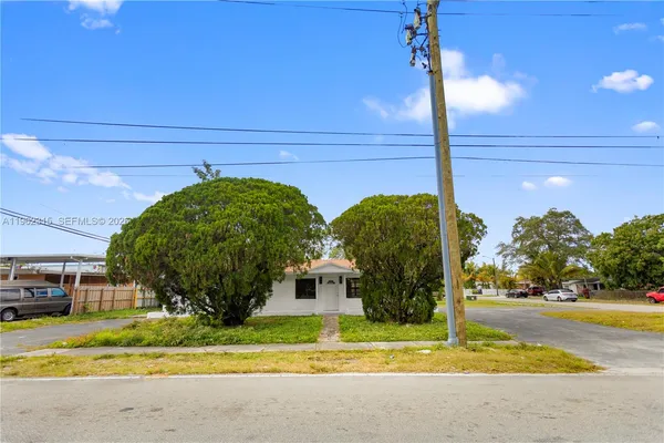 a view of a street with house on its side