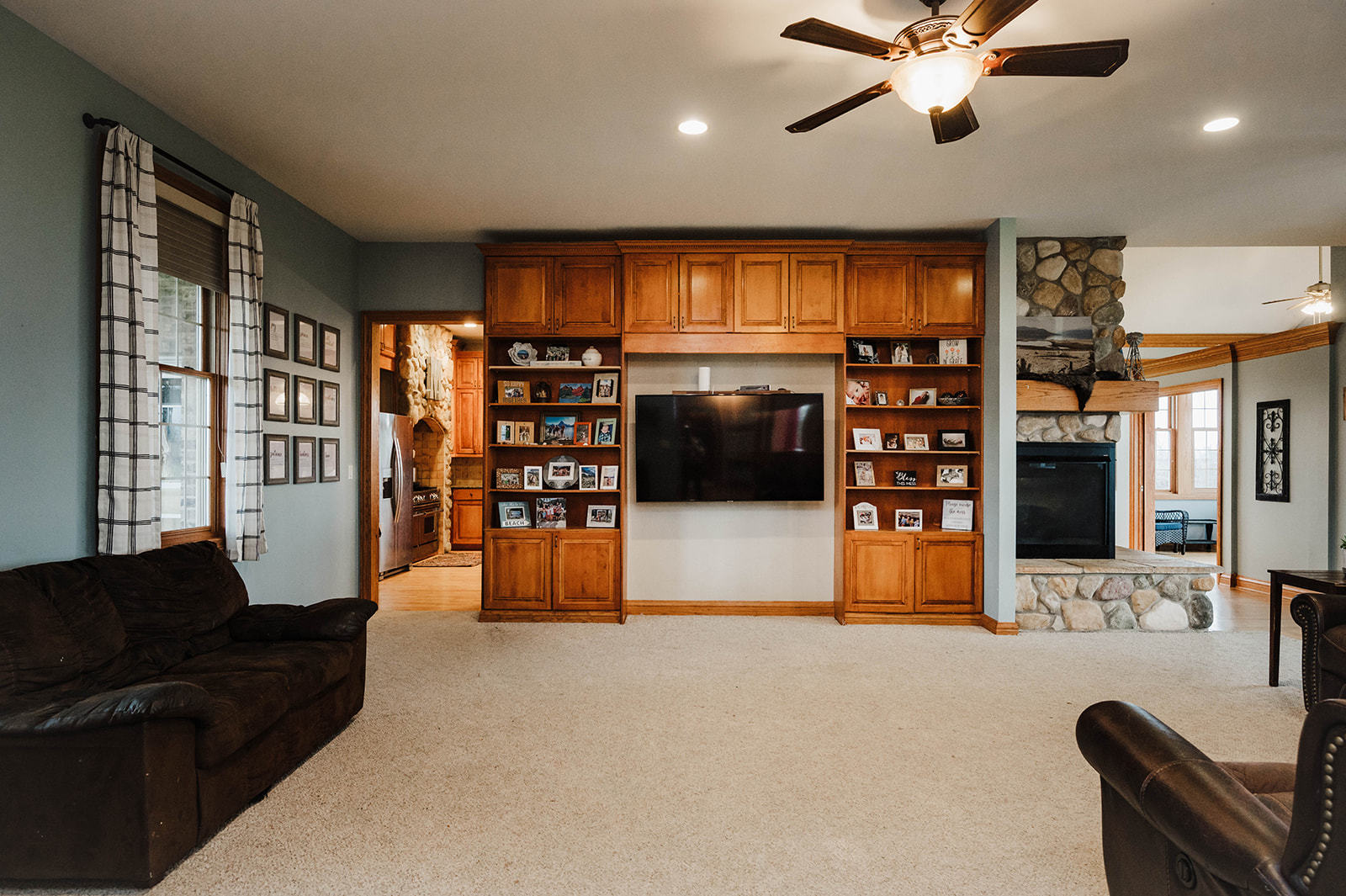 9S151 Granart Road Plano, IL 60545 - Photo 14 of 48 a living room with furniture and a flat screen tv