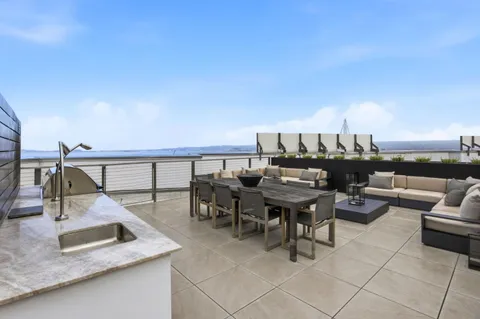 a view of a living room and dining room