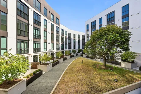 a view of swimming pool with outdoor seating
