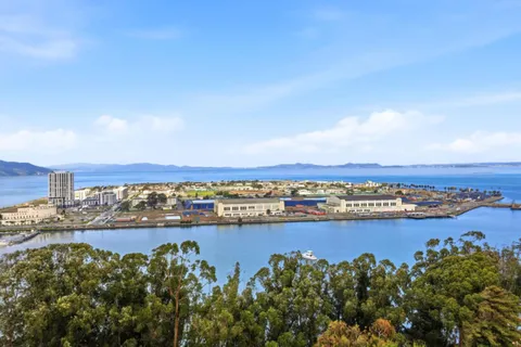a view of a city with ocean view