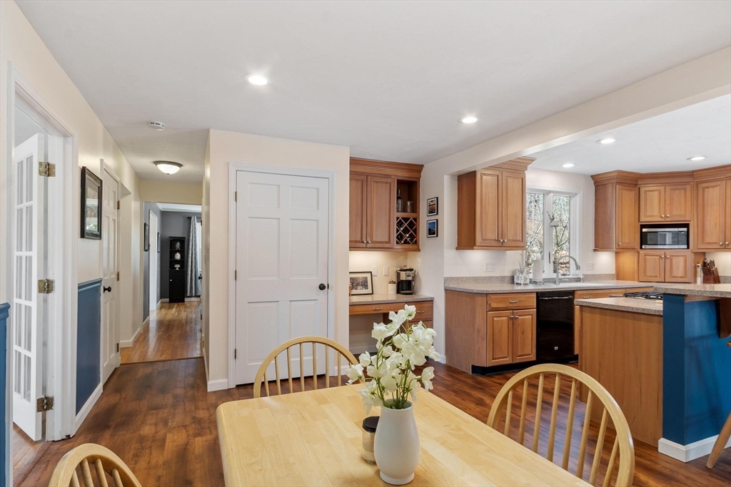 21 Potter Road Framingham, MA 01701 - Photo 13 of 42 a kitchen with kitchen island granite countertop a sink and stainless steel appliances