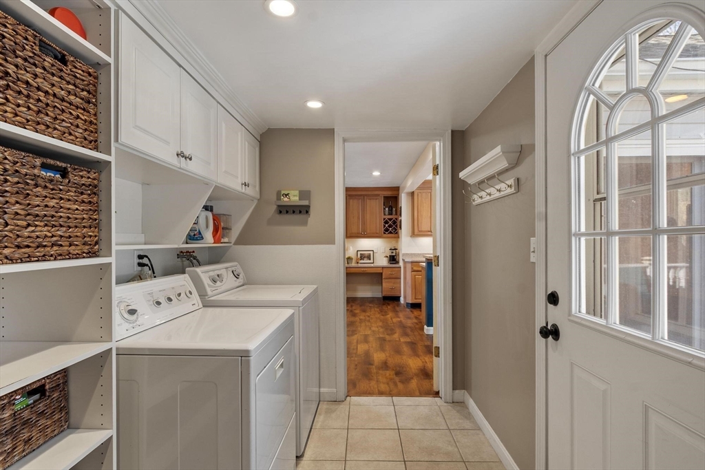 21 Potter Road Framingham, MA 01701 - Photo 14 of 42 a storage room with washer and dryer
