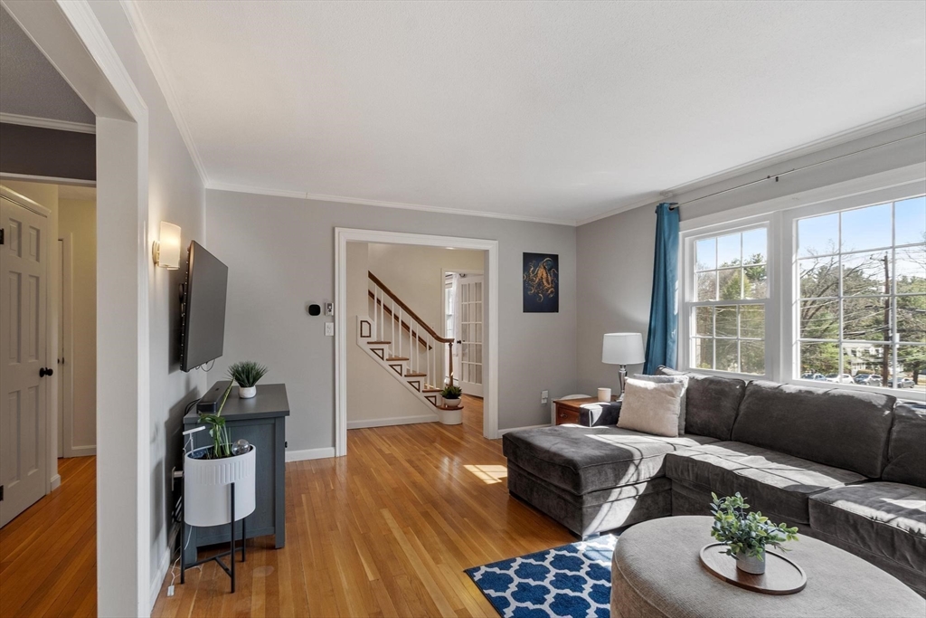 21 Potter Road Framingham, MA 01701 - Photo 20 of 42 a living room with furniture and wooden floor