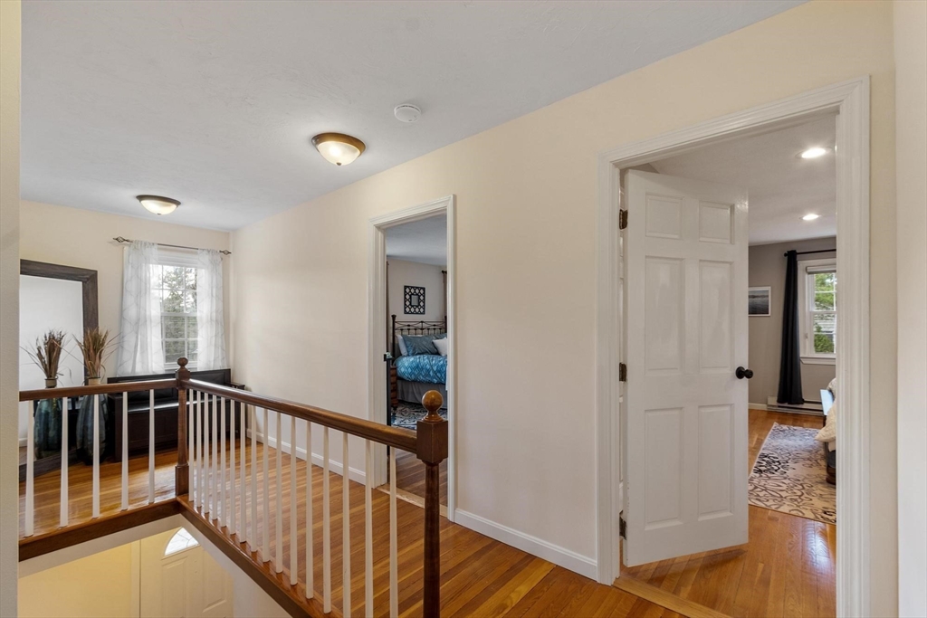 21 Potter Road Framingham, MA 01701 - Photo 22 of 42 a view of a hallway with windows and stairs