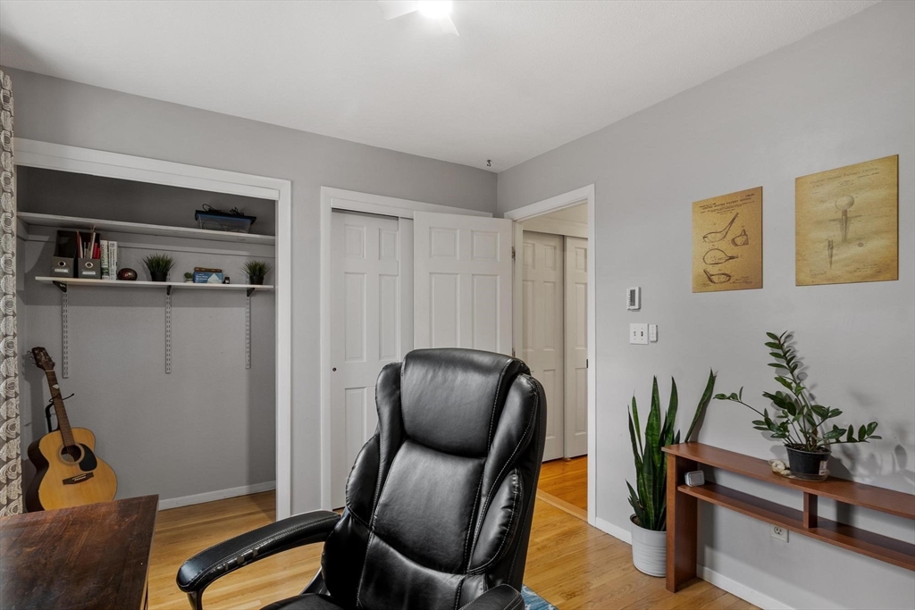 21 Potter Road Framingham, MA 01701 - Photo 30 of 42 a view of a workspace with furniture and wooden floor