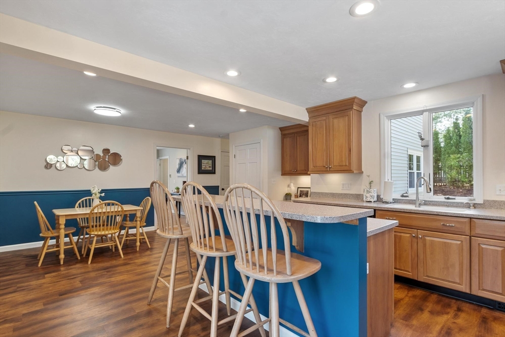 21 Potter Road Framingham, MA 01701 - Photo 10 of 42 a view of a dining room with furniture window and wooden floor
