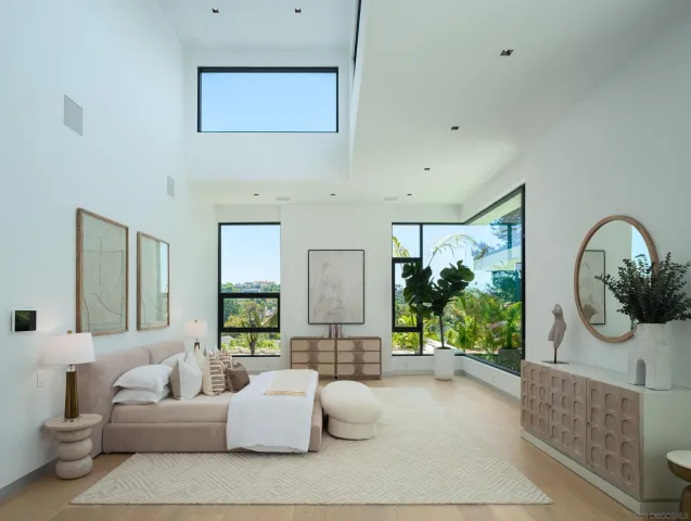 a bathroom with a toilet a sink and a mirror