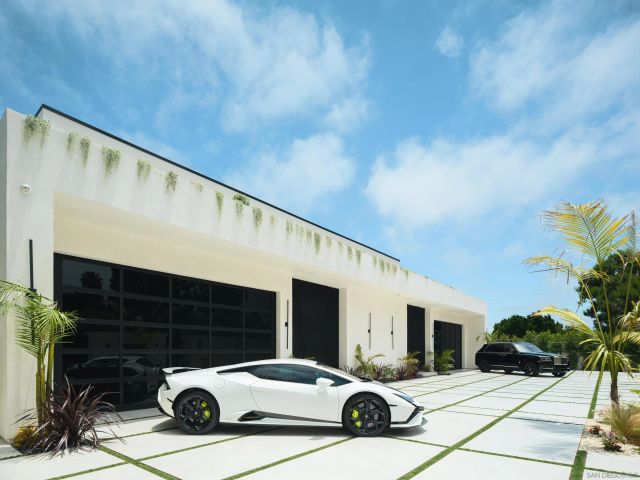 a front view of a house with yard