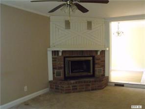 2435 Eaton Road Charlotte, NC 28205 - Photo 3 of 8 a living room with a fireplace
