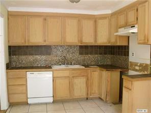 2435 Eaton Road Charlotte, NC 28205 - Photo 4 of 8 a kitchen with a sink and cabinets
