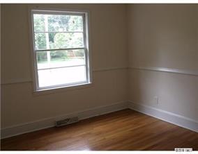2435 Eaton Road Charlotte, NC 28205 - Photo 6 of 8 an empty room with a window