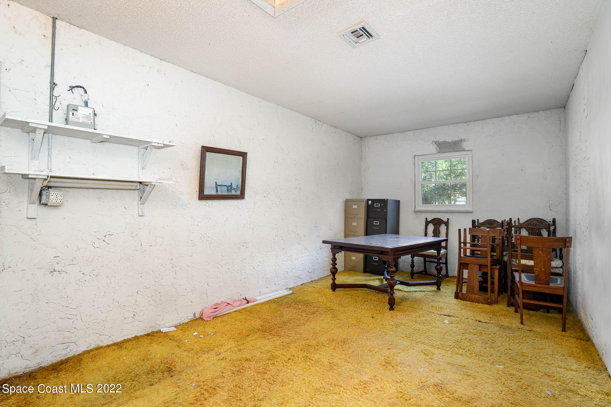 447 Count Street Melbourne, FL 32901 - Photo 24 of 24 a workspace with furniture