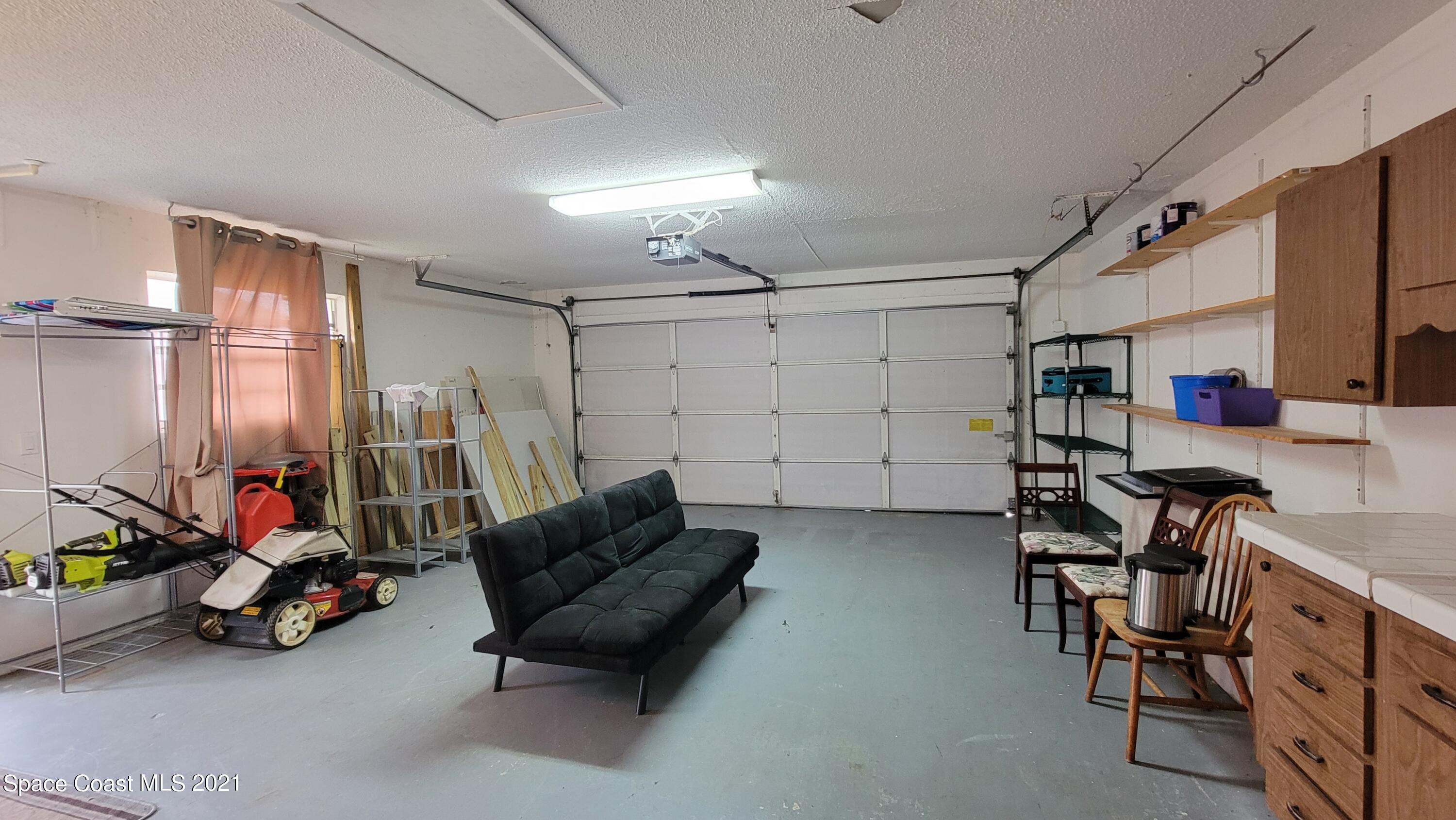 1880 Tallpalm Road Melbourne, FL 32935 - Photo 15 of 23 Garage