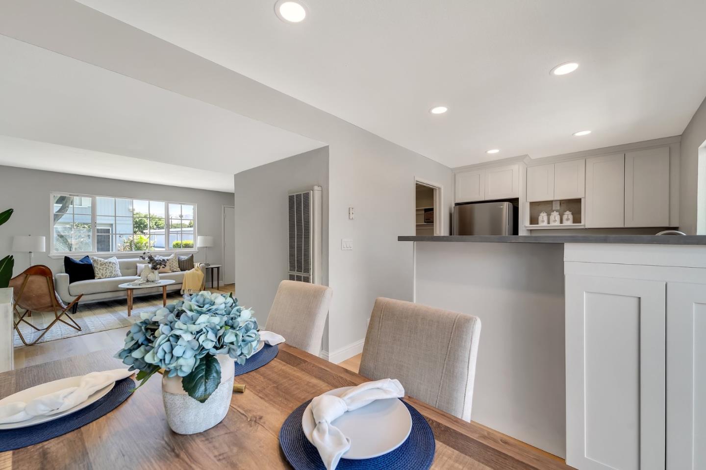 3424 Pisces Drive San Jose, CA 95111 - Photo 11 of 27 a kitchen with stainless steel appliances granite countertop a refrigerator and a couch