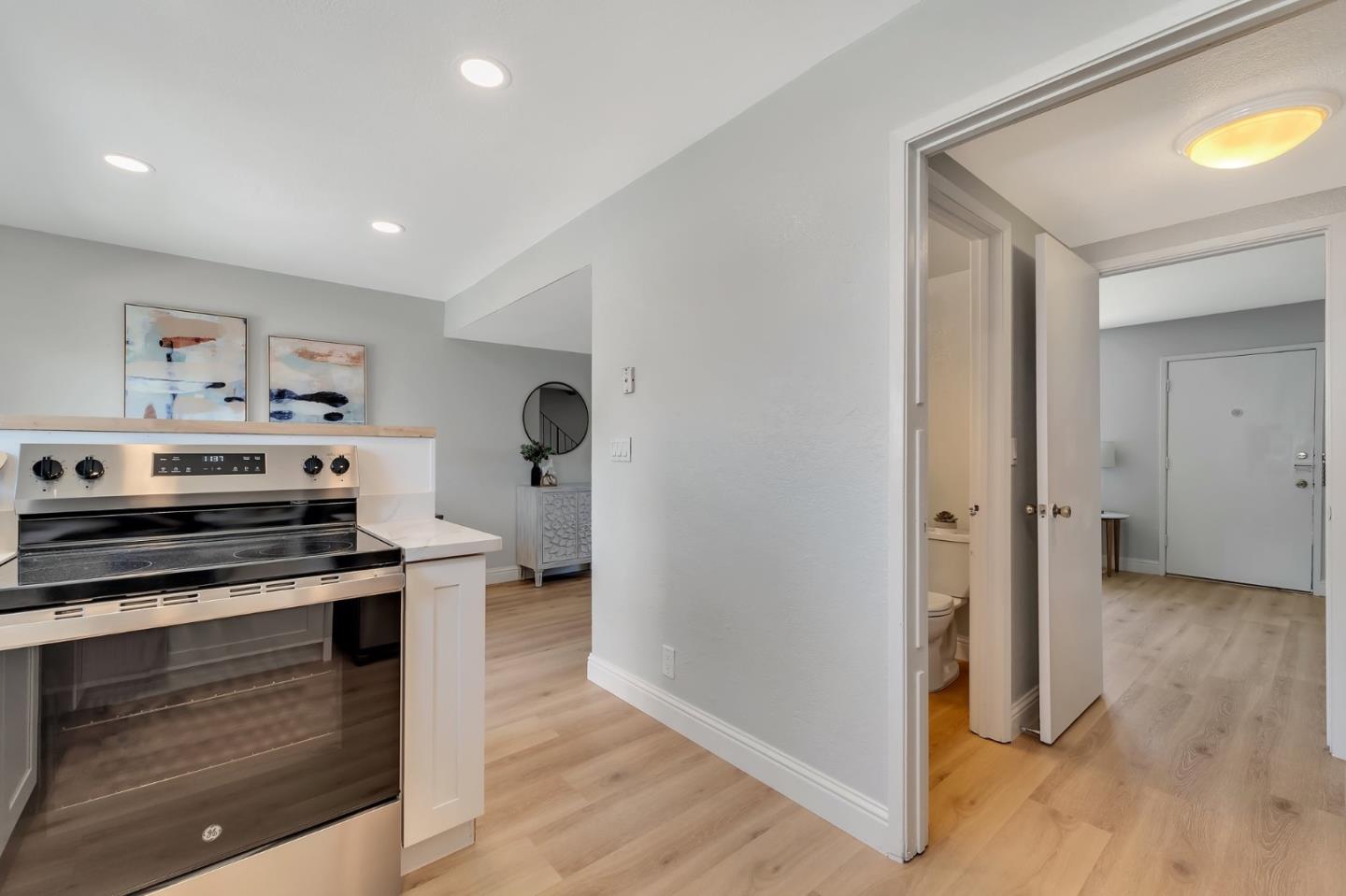3424 Pisces Drive San Jose, CA 95111 - Photo 12 of 27 a kitchen with stainless steel appliances a stove and a refrigerator