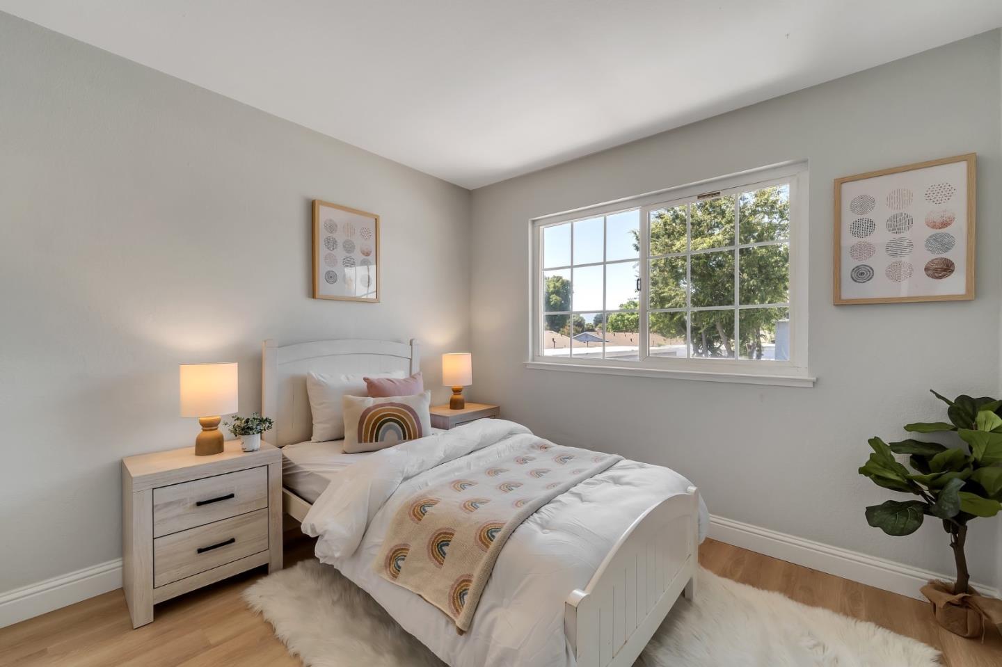 3424 Pisces Drive San Jose, CA 95111 - Photo 16 of 27 a bedroom with a bed and a window