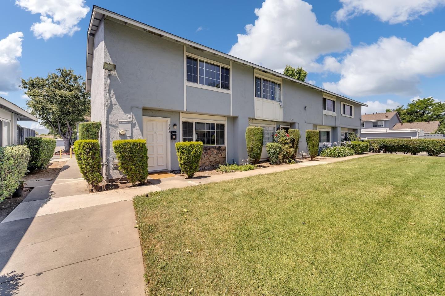 3424 Pisces Drive San Jose, CA 95111 - Photo 24 of 27 a front view of a house with a yard