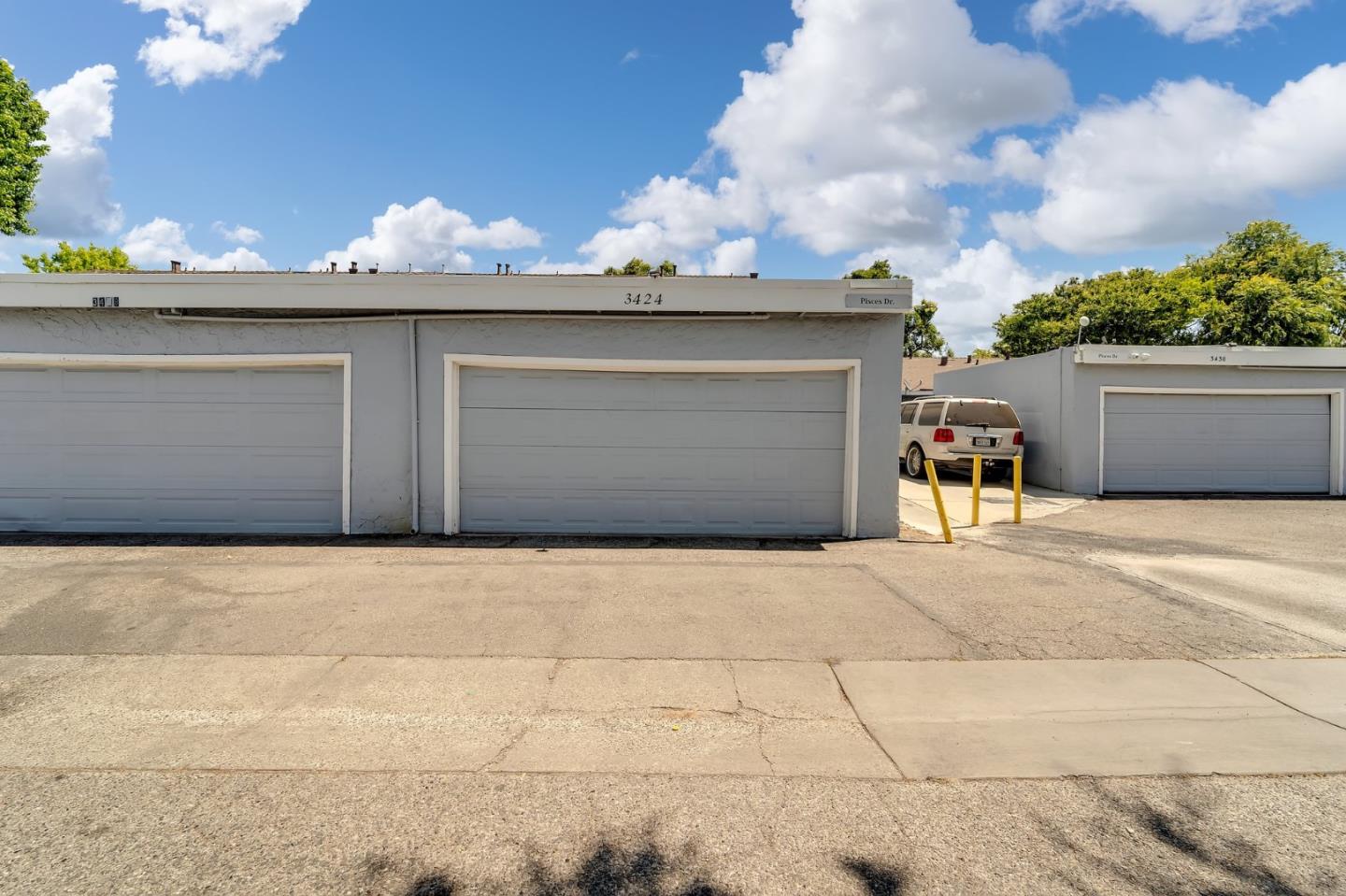 3424 Pisces Drive San Jose, CA 95111 - Photo 26 of 27 a potted plant sitting on the side of a building
