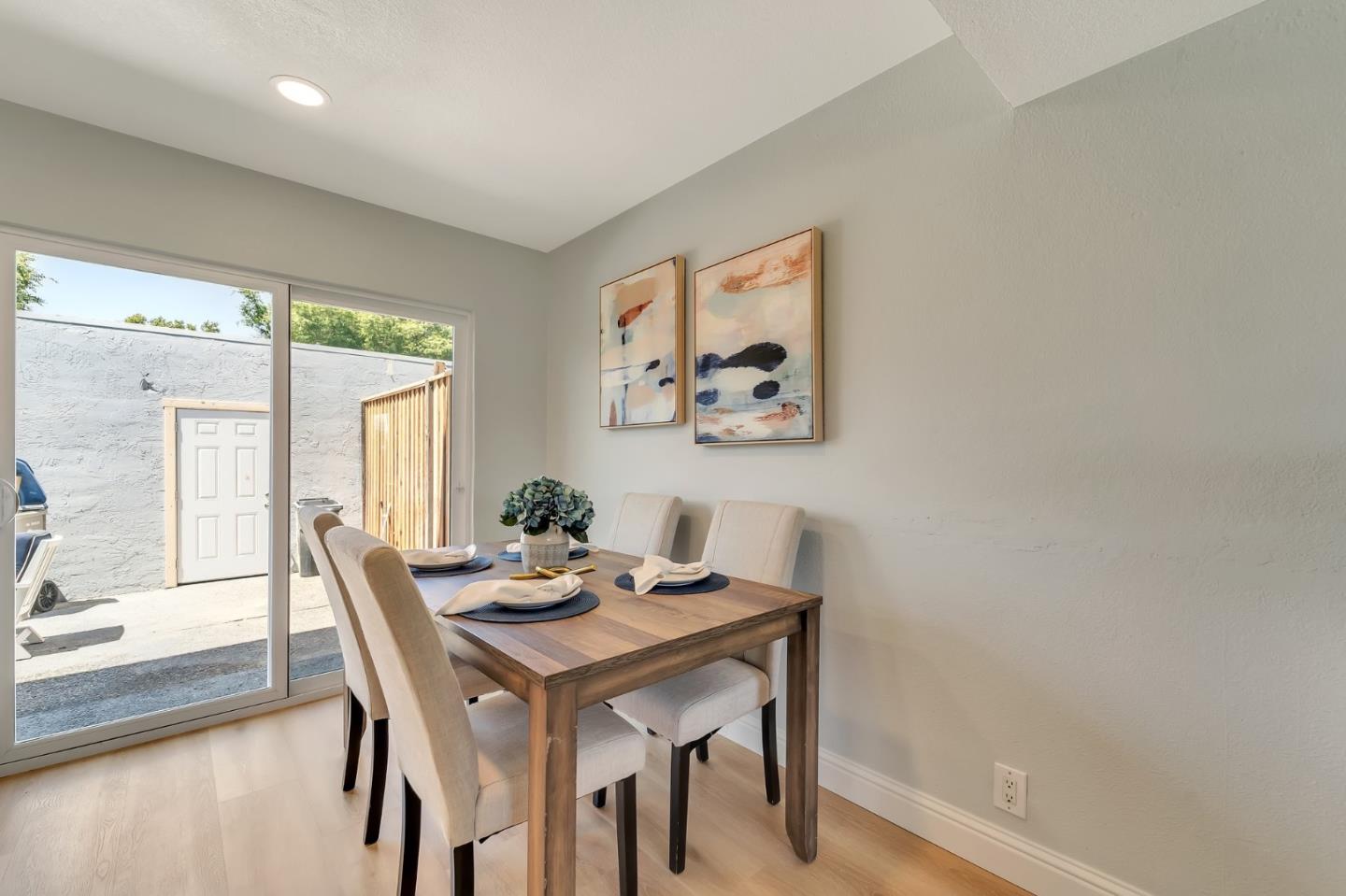 3424 Pisces Drive San Jose, CA 95111 - Photo 5 of 27 a view of a dining room with furniture window and wooden floor