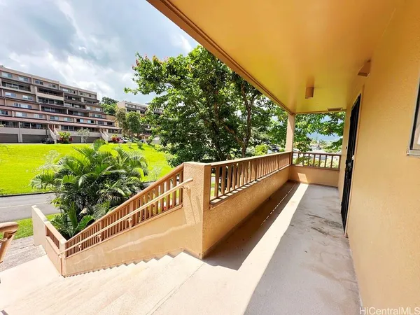 a view of balcony with flower