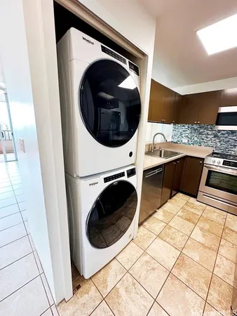 a view of a washer and dryer in a utility room