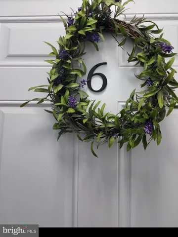 a vase of flowers sitting on a table