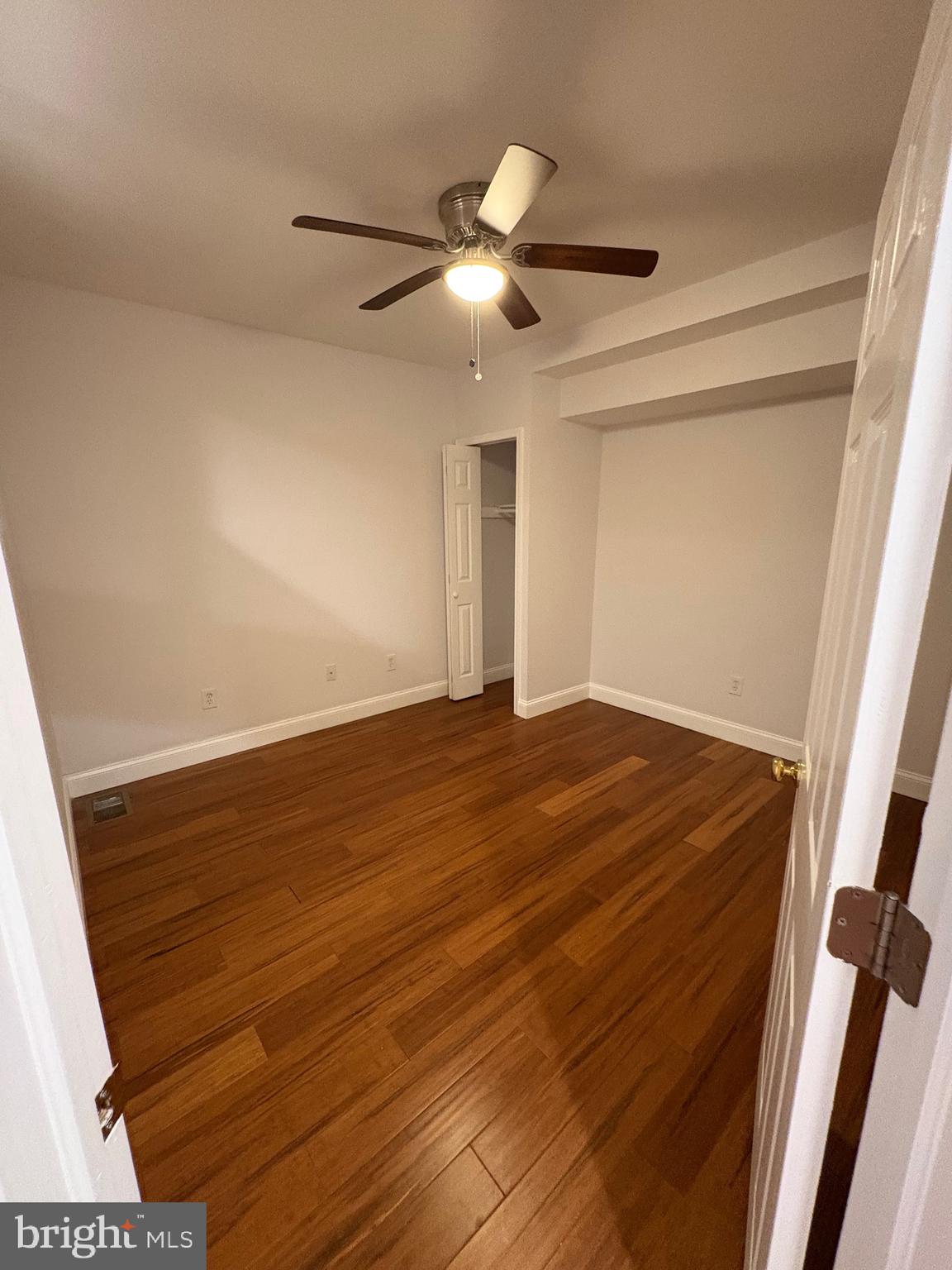 116 Grape Street, Unit 6 Philadelphia, PA 19127 - Photo 21 of 27 a view of empty room with wooden floor